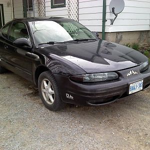 First car and soon to be winter car..  :)
Just bought VHT Nightshade last week and tinted my lights.
2 10" Subs, that fill whole trunk, Amp, Deck, P